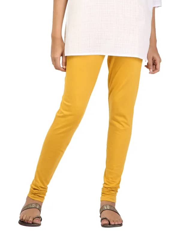 Aurelia Women Solid Yellow Leggings